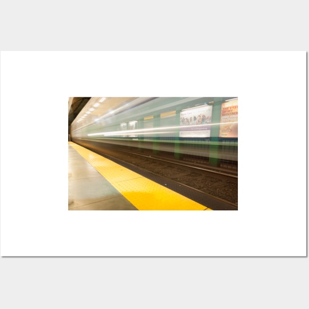 Platform with yellow line railway tracks blurred in motion blur aws train passes. Wall Art by brians101